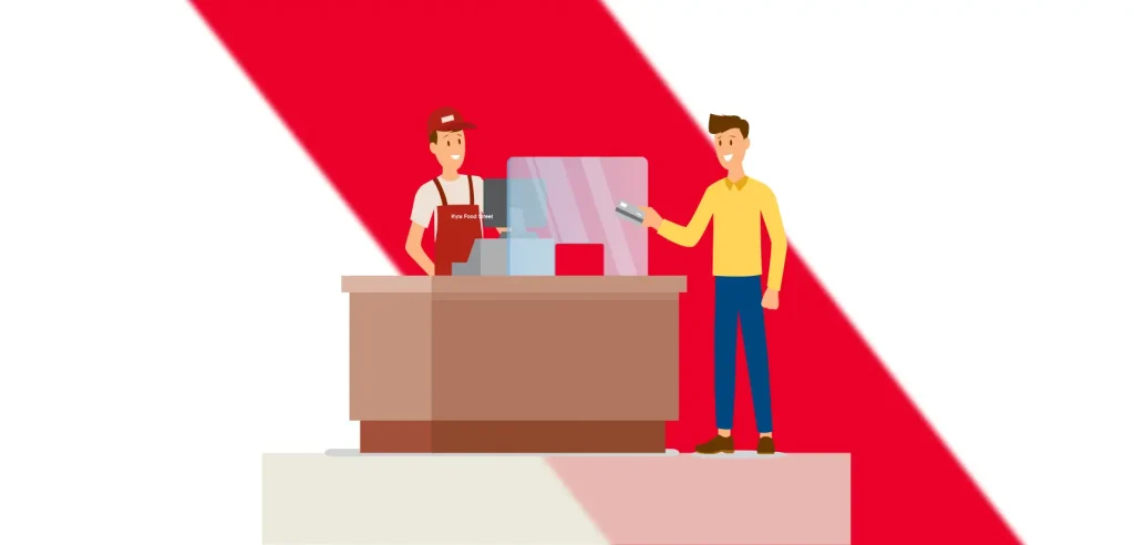Customer making a payment at Kyra Food Street counter.